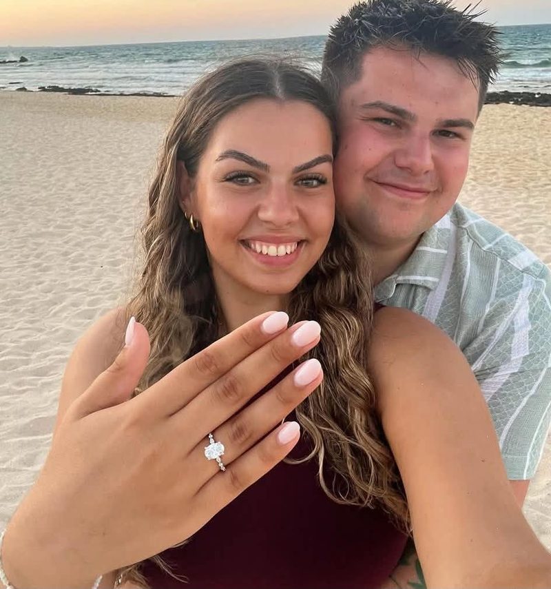 Liam and Andrea with the engagement ring at sunset